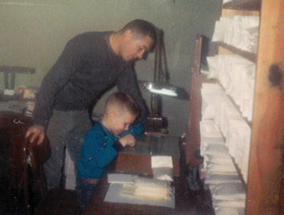 Jim Girardin Sr. with Jr. in the seed lab, 1966.