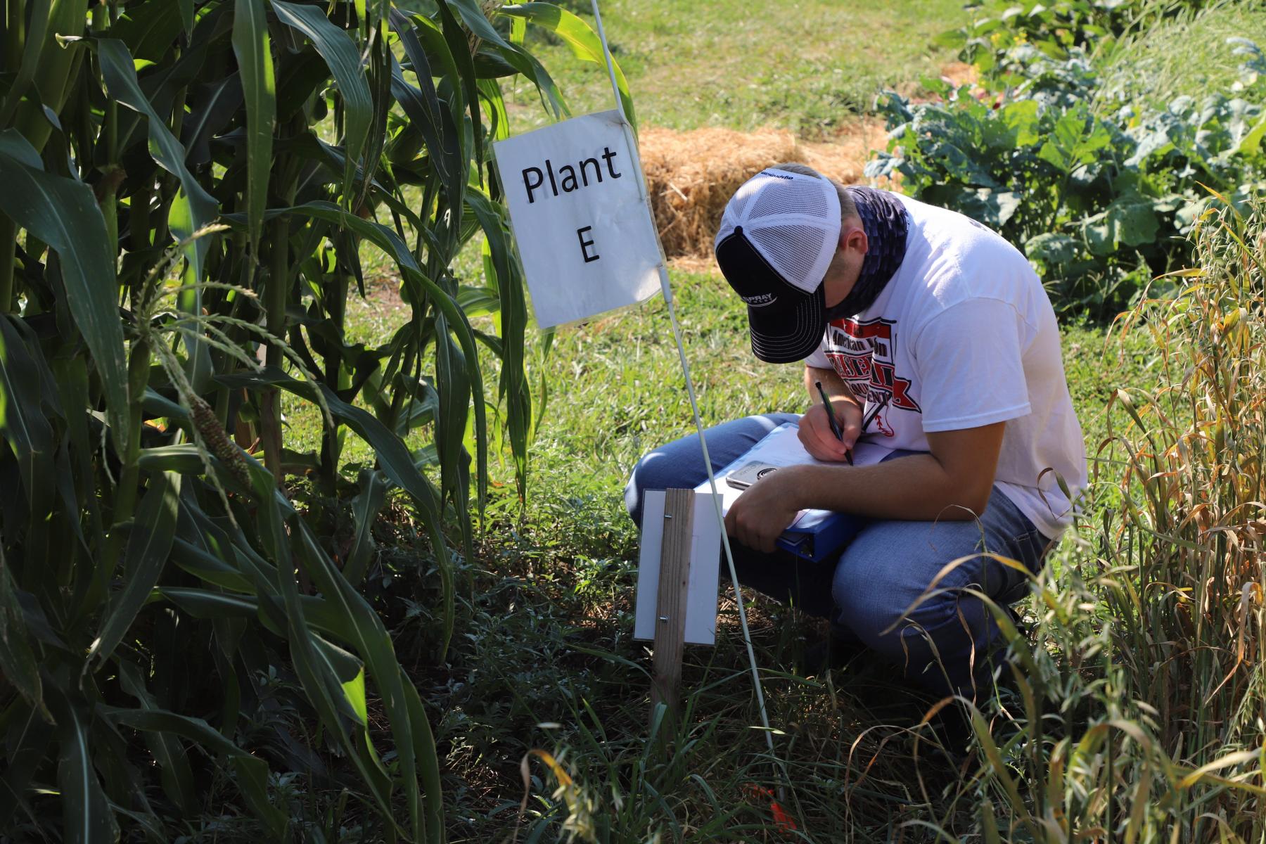 Student in East Campus teaching garden