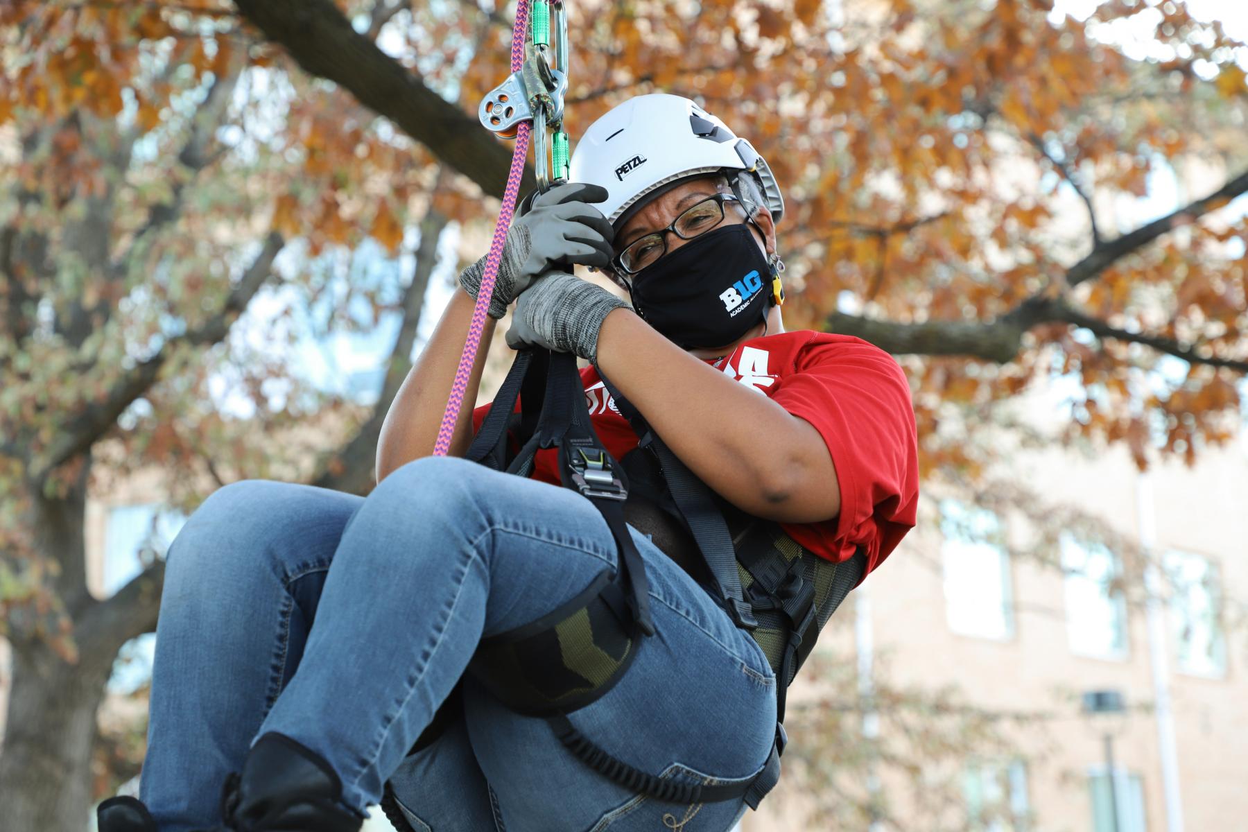 Martha Mamo climbs tree on East Campus