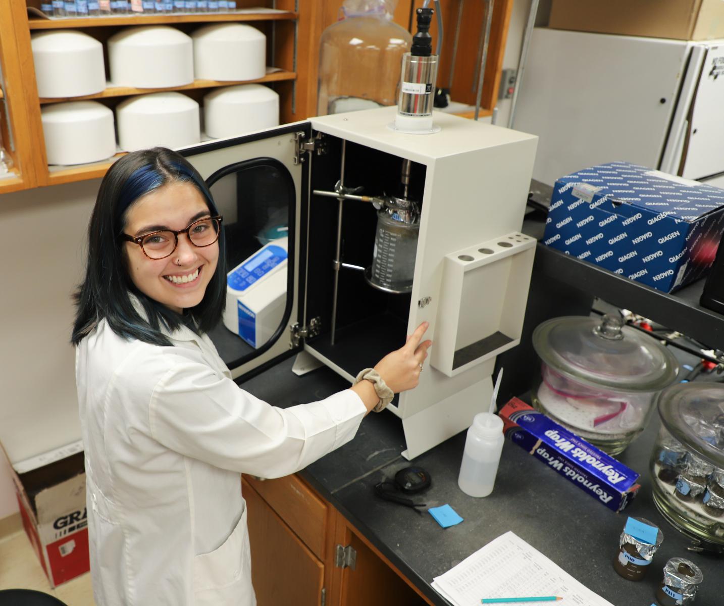 Sophia Merritt, sophomore horticulture major, at work in Department of Agronomy and Horticulture assistant professor Andrea Basche’s lab.