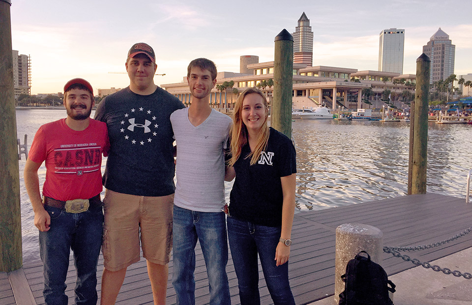 Rodger Farr (from left), Shawn McDonald, Kolby Grint and Samantha Teten stand in front of the Tampa Convention Center during the ASA-CSSA-SSSA 2017 Annual Meeting.