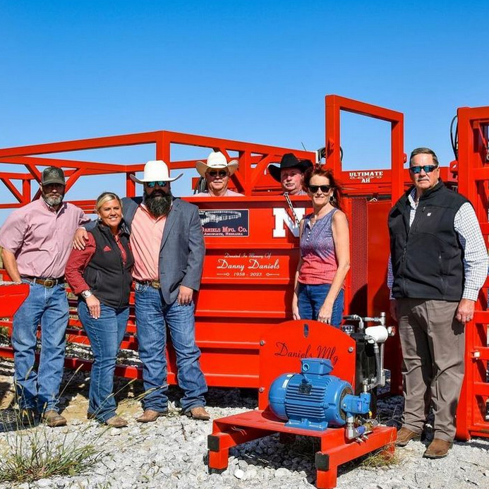 Daniels Manufacturing Co. family and board members stopped by the Klosterman Feedlot Innovation Center to see equipment donated in memory of Danny Daniels.