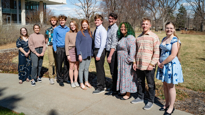 Newest Alpha Gamma Chapter inductees pose with past officers. From left are Jamie Dasenbrock, past vice president, Sage Eckard, Cole Hammett, Benjamin Knudsen, Tori Boden, Macey Wooldrik, Jacob Nichols, Jacob Hillis, Deanna Montanez Mendoza, Nathan Starr, and Elizabeth Cunningham, past president. | Photo courtesy of Luqi Li