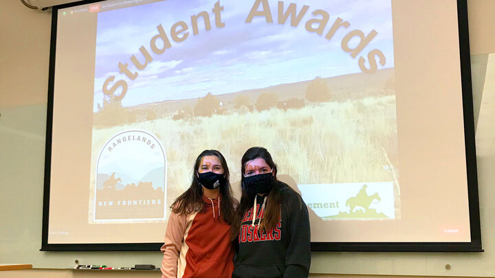 Asha Scheideler (left) and Kaitlyn Dozler celebrate Dozler's win during the Range Management Clubâs 2021 virtual awards ceremony watch party in February.