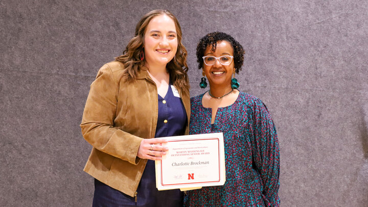 Charlotte Brockman,left, received the the Martin A. Massengale Outstanding Senior Award from Martha Mamo, 
