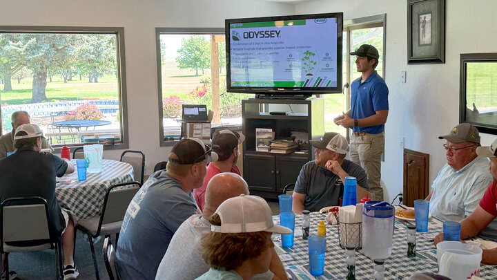 Zach Nienhueser, a University of NebraskaâLincoln agronomy major and summer intern for Helena Agri-Enterprises out of Norkfolk, speaks to producers at a grower meeting.