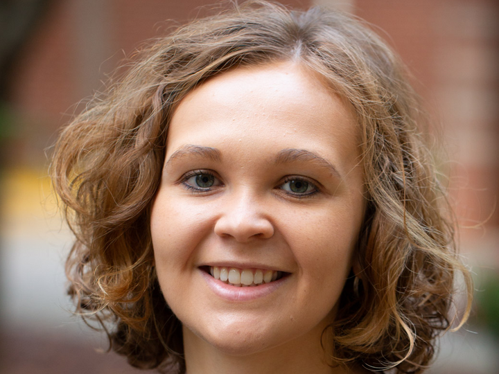Erin Kinley smiles for her headshot
