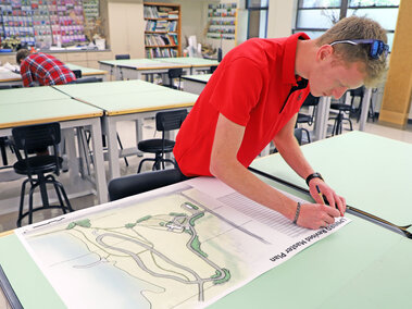 Cory Schumacher, a senior plant and landscape systems major, prepares his final landscape design project to present to his client in the PLAS 469 Ecological Landscape Design class. The course is taught by Kim Todd, professor of agronomy and horticulture. Schumacher received a Bachelor of Science in PLAS in May and now works as a noxious weed inspector for Lancaster County.