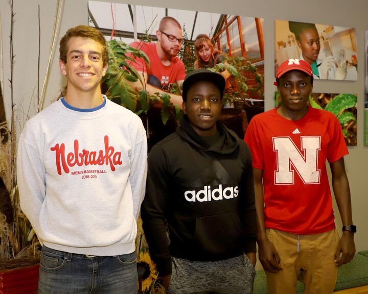 Regan Kerkman, left, Terence Irumva and Jean d'Amour Ndatira.