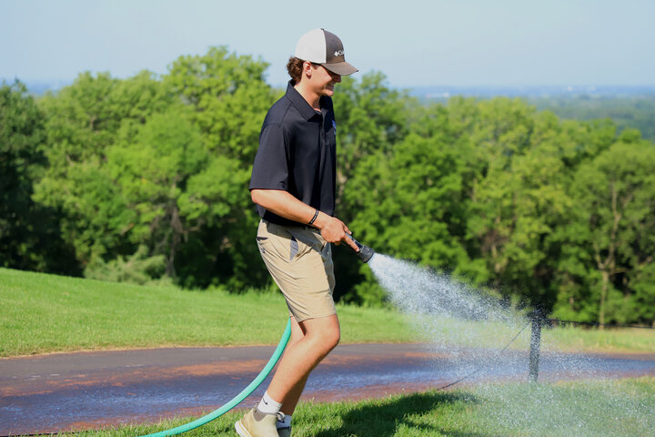 Nate Agosta hand-waters
