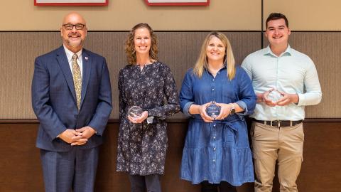 Mike Boehm, Harlan Vice Chancellor of IANR (from left), presents the Omtvedt Innovation Team award to the Cultivate ACCESS team members Leah Sandall, Julie Bray-Obermeyer and Logan Newman. Loren Rye | Pixel Lab