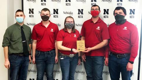 The University of Nebraska–Lincoln Crops Judging Team earns third place at the Nebraska College of Technical Agriculture Collegiate Crops Contest March 6 in Curtis, Nebraska. Coach Adam Striegel (from left) stands with team members Jared Stander, Katie Steffen, Korbin Kudera and Jacob Vallery.  