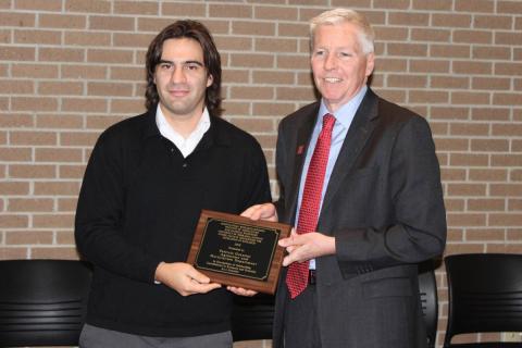Grassini (left) honored with the Junior Faculty for Excellence in Research Award given by ARD Dean Archie Clutter.