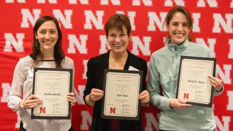 Andrea Basche, left, Kim Todd and Cheryl Dunn are honored at the 2022 Parents’ Recognition Awards ceremony March 4. Mike Jackson | Student Affairs Marketing & Communication