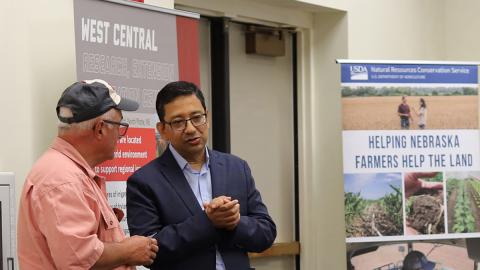 Bijesh Maharjan, right, Nebraska Extension soil nutrient and management specialist, speaks to an attendee at the second Soil Health School at the West Central Research Extension and Education Center in North Platte. Photo by Nicole Heldt